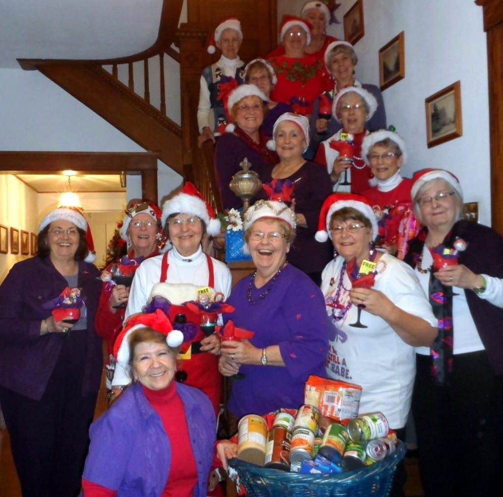 RED HATTERS ... Rouge Dames collect food for the food pantry:  (row 1)  Marty Brace, (row 2)  Rosanne Fisher, Nina Fackler, Marillyn Scott, Charlene Williams (Queen Mother), Cheryl Gallagher (guest), Greta Crilley, (row3)  Shirley Harding, Delores Dennis, row 4)  Mary Jane Stevens, Dorothy Briner, (row 5)  Jan Clark, Jane Kwader, (row 6)  Carolyn Figgins, Jean Hicks and JoAnne Bandeen