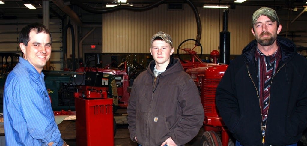 Four County Career Center hosted a Career Night Open House Monday evening with the Career Center’s labs and classrooms open to the public. Instructors and counselors were available to answer questions and acquaint visitors with career and technical programs and college credit options. Shown talking about the Agriculture/Diesel Mechanics program at the Career Center are (LEFT TO RIGHT) Agriculture/Diesel Mechanics instructor Jason Elston; with Kenny Fish; and Matt Mulligan (both from Edon).