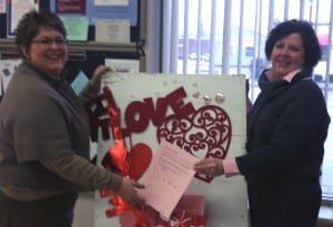 Valentines WEB - The Village Reporter VALENTINES ... Shown above are Cheryl Renard, the help desk coordinator at the One Stop, is assisting Nancy Johnson, Executive Director with the Valentine’s for Hope Project Display. Forms can be picked up at the One Stop at 228 S. Main St. Bryan, OH or visit the www.cancerbridge.org site to order online.