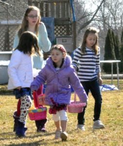 Teaghan Blad, Paige Blad, Myranda Streng, and Ema Heckel venture off to gather eggs. 