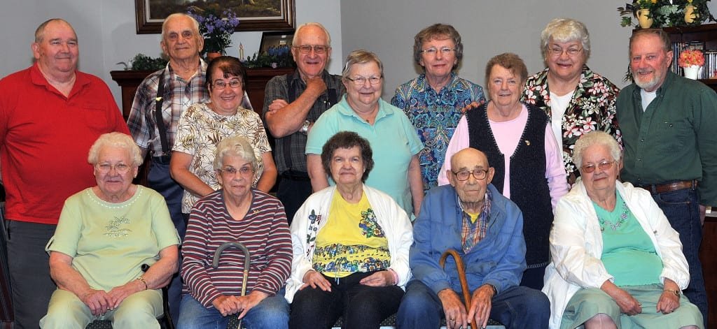 HAPPY BIRTHDAY! … Celebrating June Birthdays at Montpelier Senior Center on Thursday, June 13, 2013 were seated, from left, Marie Trausch (whose family flew in to surprise her at the Center for her 90th Birthday that day), Janice Burkhart, Sue E. Kemp, Russell Dunseth, Charlene Housh and standing, Norm Bechtol, Willis Bible, Linda Downs, Ralph Cramer, Sandie Cluckey, Virginia Will, Linda Moore, Judy White and Jack Hancock.  Hosting this month’s celebration was Ramada Inn and Suites; Paul O’Brien provided the musical program.  In addition to announcing Frank Stahler (floral arrangement from Huntington Bank Tellers) and Marie Trausch (two free Senior Center Lunches) as June’s Monthly Door Prize winners, Site Manager Jewel Head was also pleased to announce Linda Downs, Carol Brumbaugh, Donna Stahler, Jean Dye, Eunice Williams, Kathy Cramer, Connie Cogswell, Charles Cluckey, Delores Dennis, Dean Cogswell, Betty Freese and Betty Wheeler as winners of candy-filled table decorations, provided by Ramada Inn and Suites.  