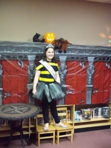 LOCAL ROYALTY ... Junior Miss Pioneer Emily Eustace poses for a picture in the photo booth.