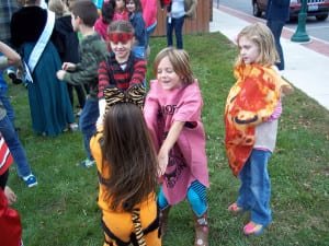 EVERYBODY FREEZE! ... The youngsters braved the chilly temperatures to play the appropriately titled Halloween Freeze Dance.