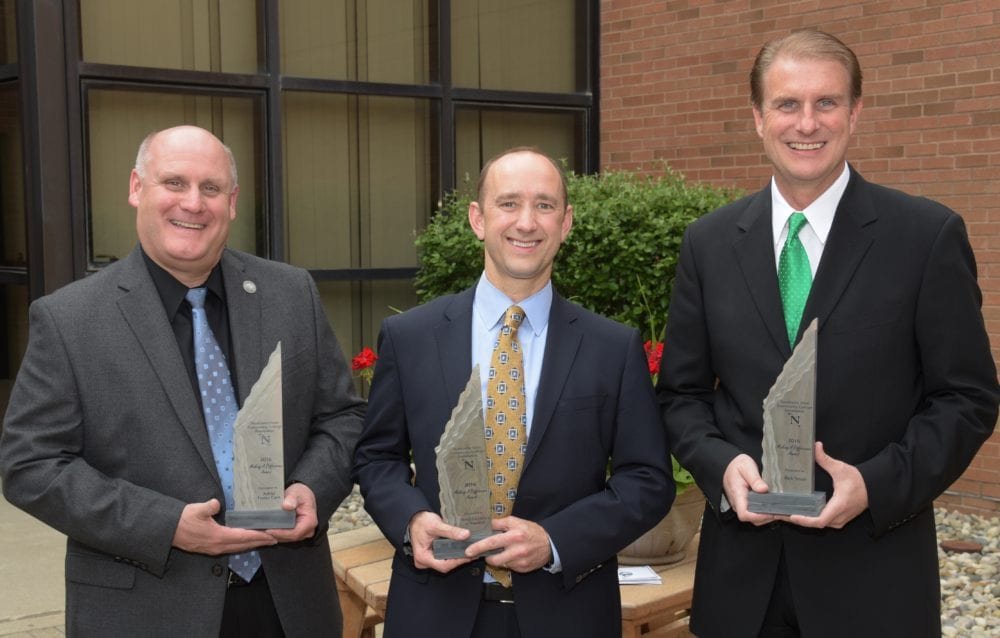 NSCC Green Carpet Event WEB - The Village Reporter Todd Hanes, President and CEO of Adriel, Dr. Michael Carpenter, Dental Excellence of Napoleon and Rick Small, WDFM/Mix 98.1, holding their 2016 Making a Difference Awards.