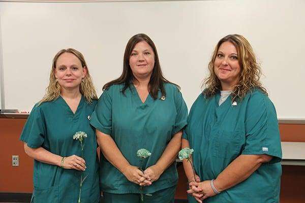 Williams County graduates are: Lynnet Baker (Pioneer), Heidi Bauer (Montpelier), Nicole Mauk (Montpelier). Absent: Minnie Cain (Williams).