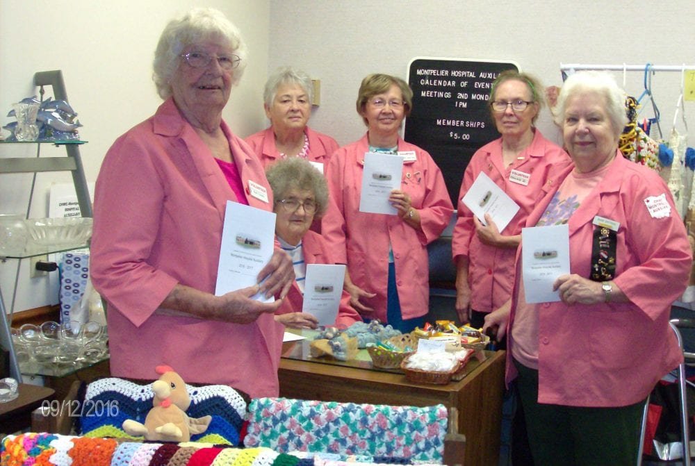 hpim1873-web - The Village Reporter CHWC-Montpelier Hospital Auxiliary Executive Board members are preparing to begin a new year celebrating September Membership Month with a special promotion Wednesday, Sept. 28th from 9:00 a.m. until 3:00 p.m. at Miller’s New Market, Whitaker Way, Montpelier. Pictured with new program booklets for the 2016-17 year in the auxiliary hospital gift shop are from left, Ruth Cooley, assistant gift shop manager; Vivian Brown (seated), gift shop manager; Carol Eriksen, vice president; Armeda Sawmiller, president; Connie Dunseth, secretary; and Barb Dietsch, treasurer. The regular meeting of the auxiliary will be Monday, Oct. 10th at 1:00 p.m. in the hospital conference room with Phil Ennen, Community Hospitals and Wellness Centers President & CEO, scheduled as speaker.