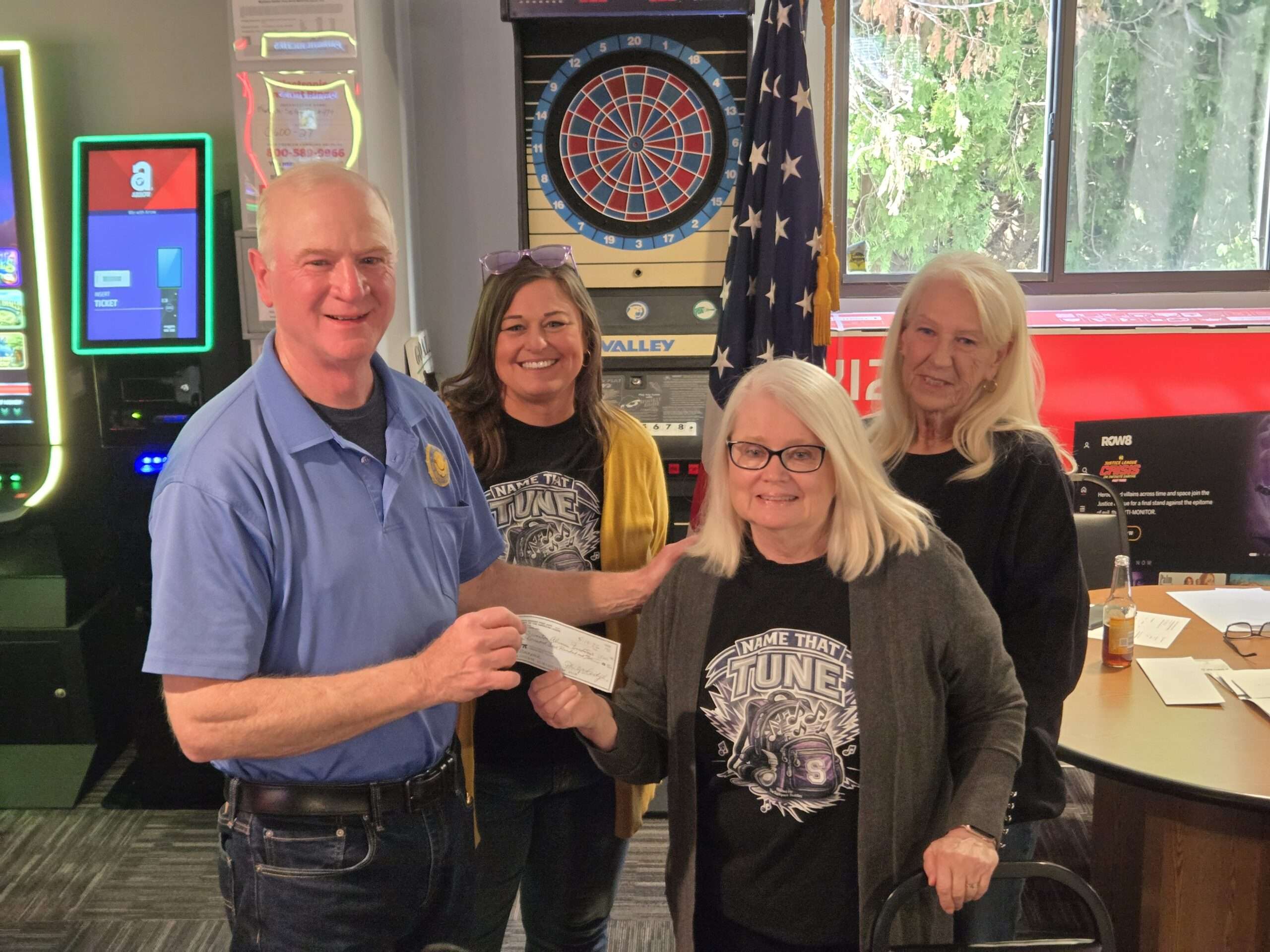 Sons of the American Legion present a $1,500 check to Backpack Buddies volunteers at the Swanton American Legion
