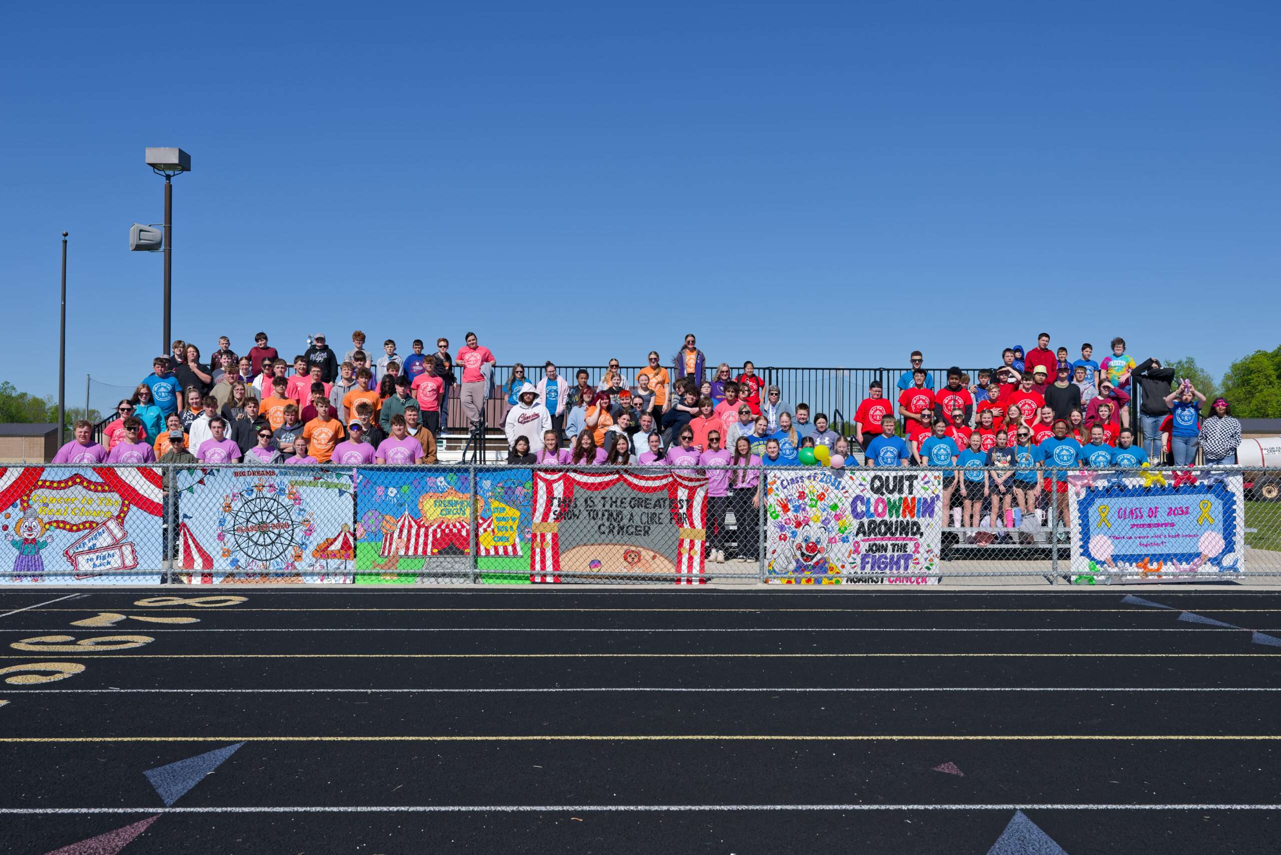 Fayette Local School students gathered on the bleachers at the track during Relay for Life activities.