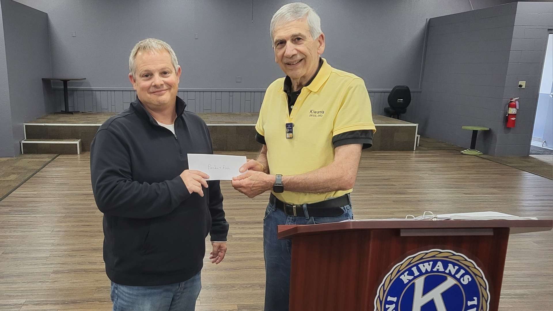 Kiwanis Club of Bryan presents $1,500 check for memorial park bench at Lincoln Park