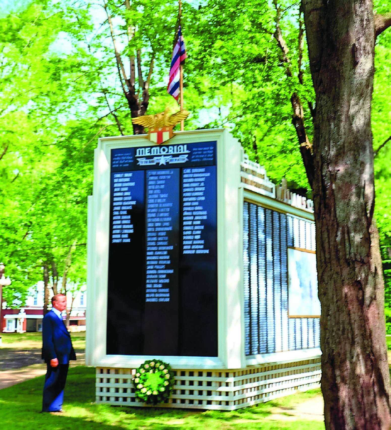 Colorized vintage photograph of the World War II Service Men's Honor Roll on the Williams County courthouse grounds in Bryan, Ohio.