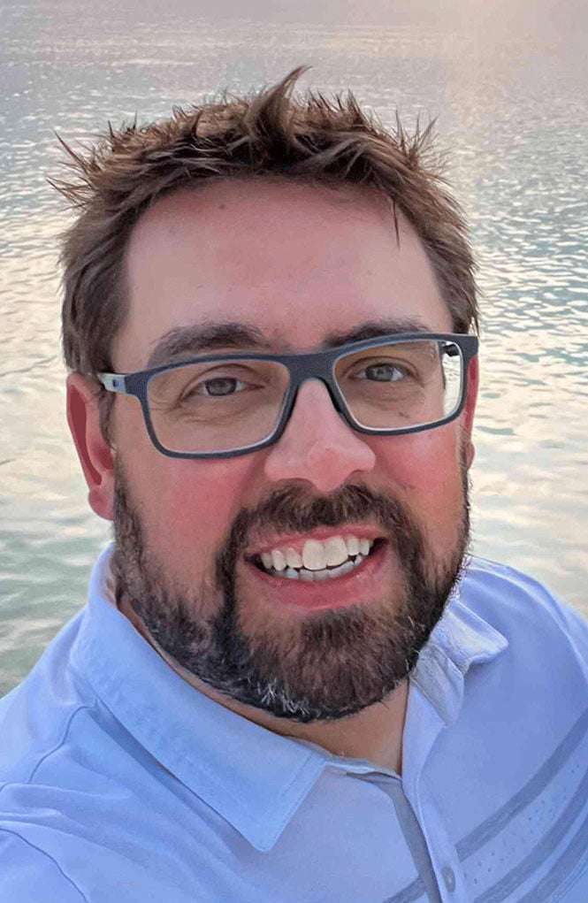 Portrait of Adam Ruihley
