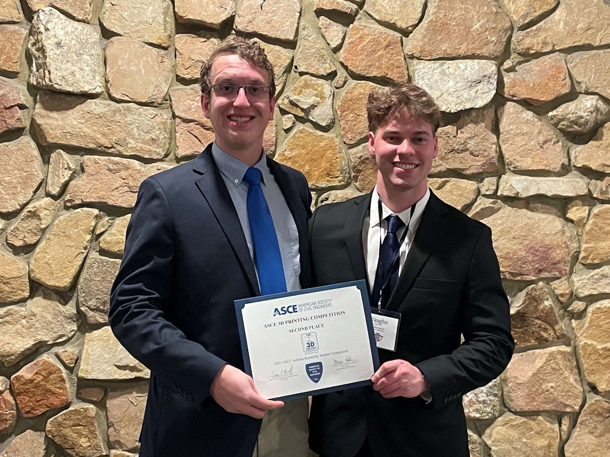 Trine University civil engineering students, from left, Luke Weintz of Fairfield, Ohio, and Vaughn Cooper of Angola, Indiana, placed second in the ASCE 3D printing competition.