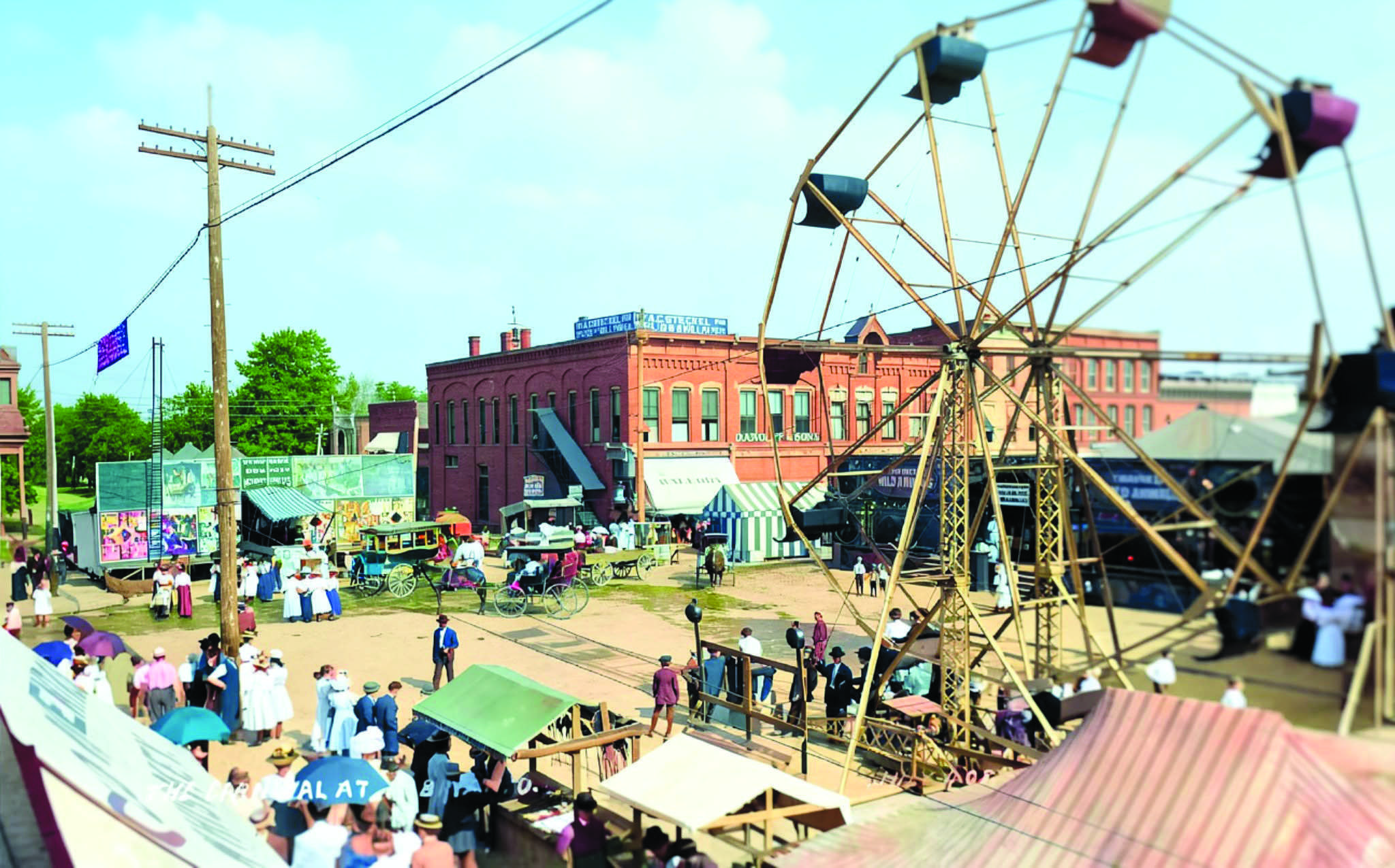 Colorized view of the 1908 Bryan Merchants’ Carnival looking southeast from High Street, with the Big Eli Ferris wheel at right