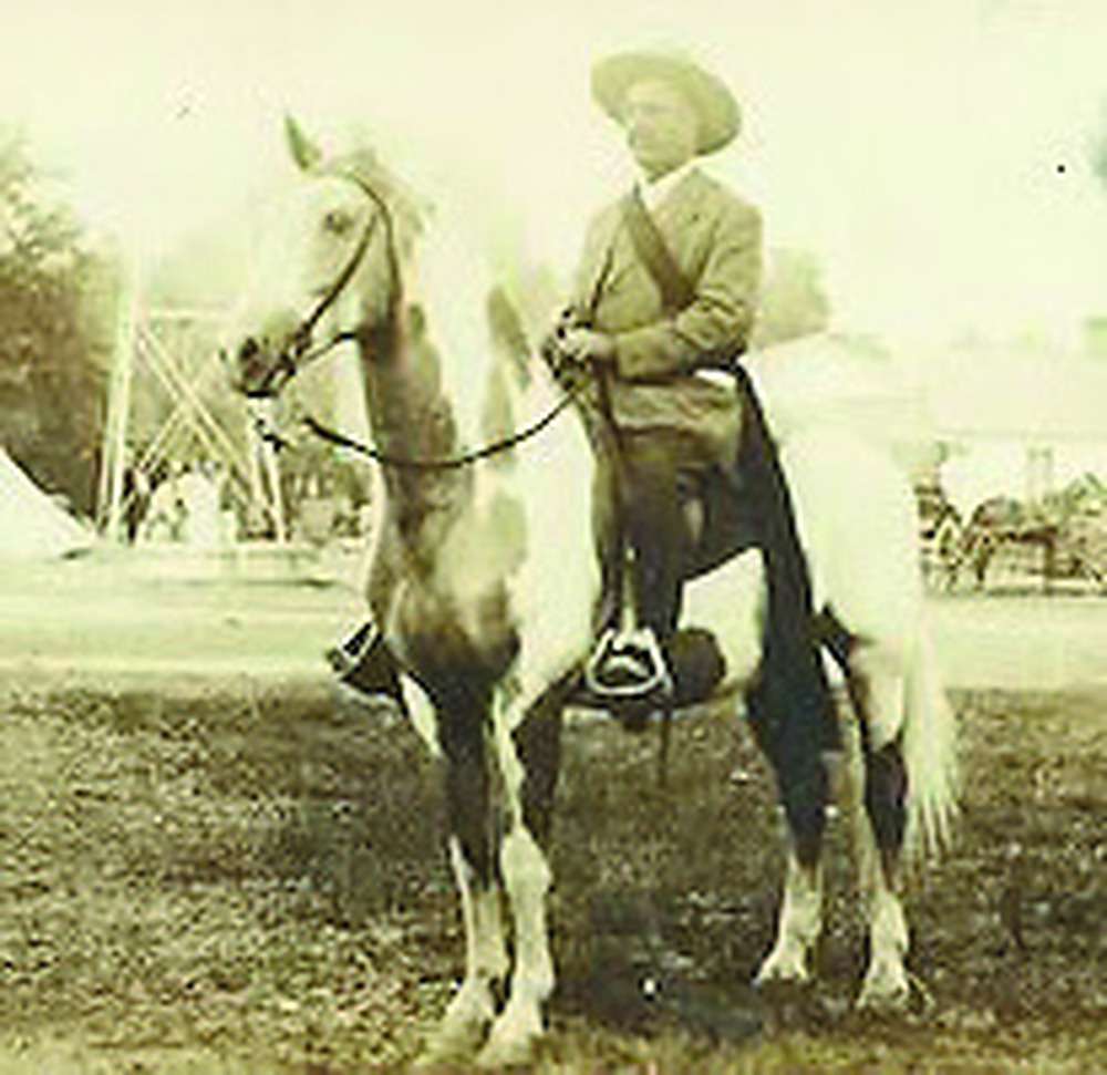 Dr. Louie Cosgrove of Swanton on horseback, 1912