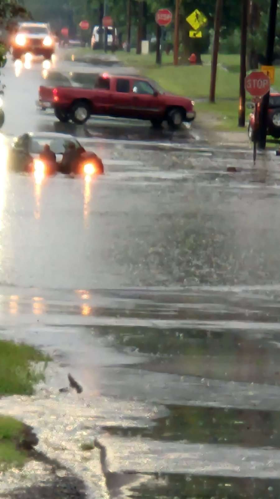 Rain-soaked traffic on a Montpelier-area roadway during heavy rain, July 17, 2026.