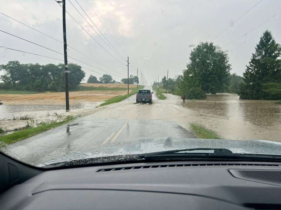 Floodwater crosses a rural roadway in the Montpelier area, July 17, 2026.