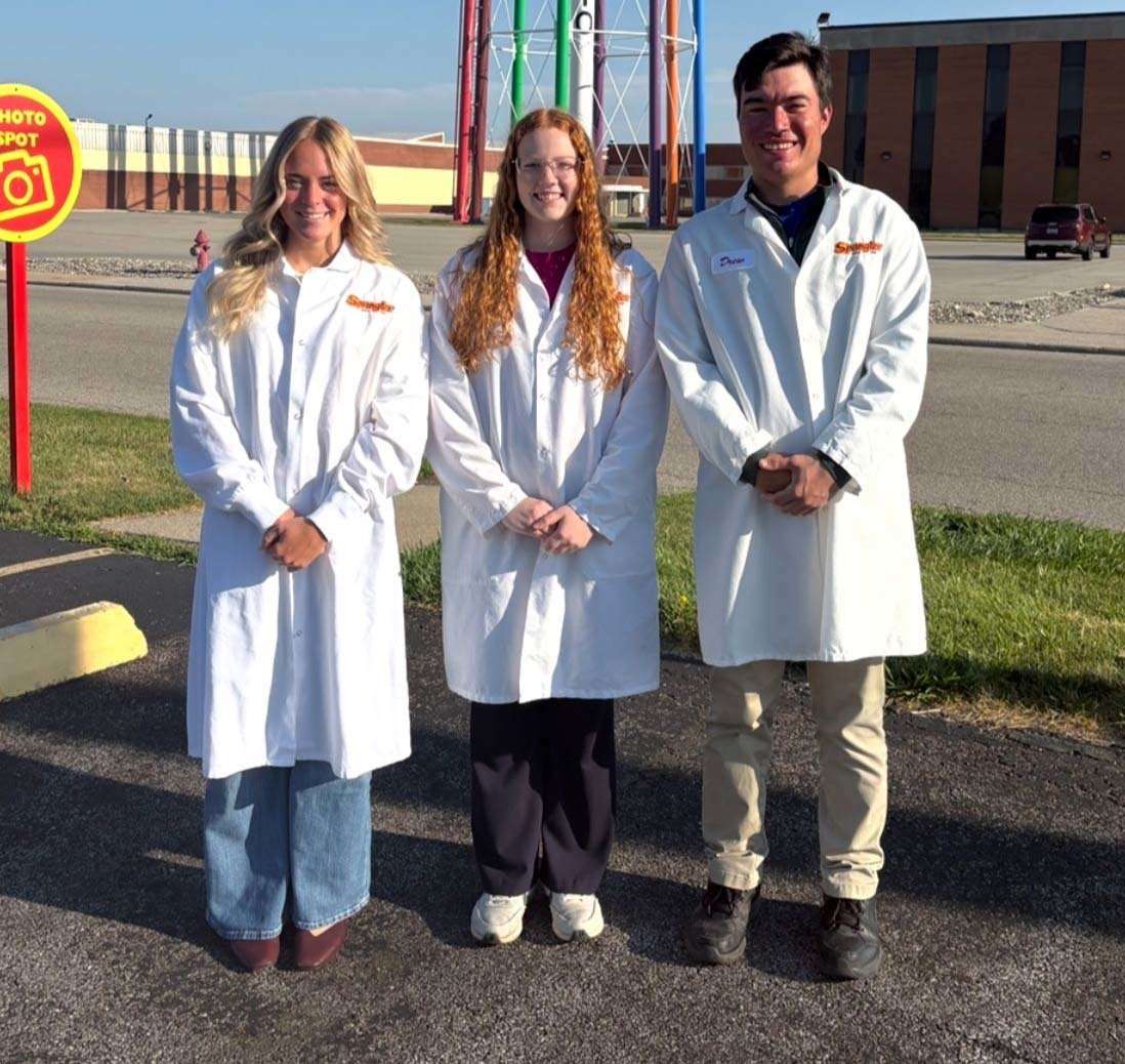 Julia Dickinson, center, with fellow Spangler Candy Company interns Makayla Miller and Drew Dauber