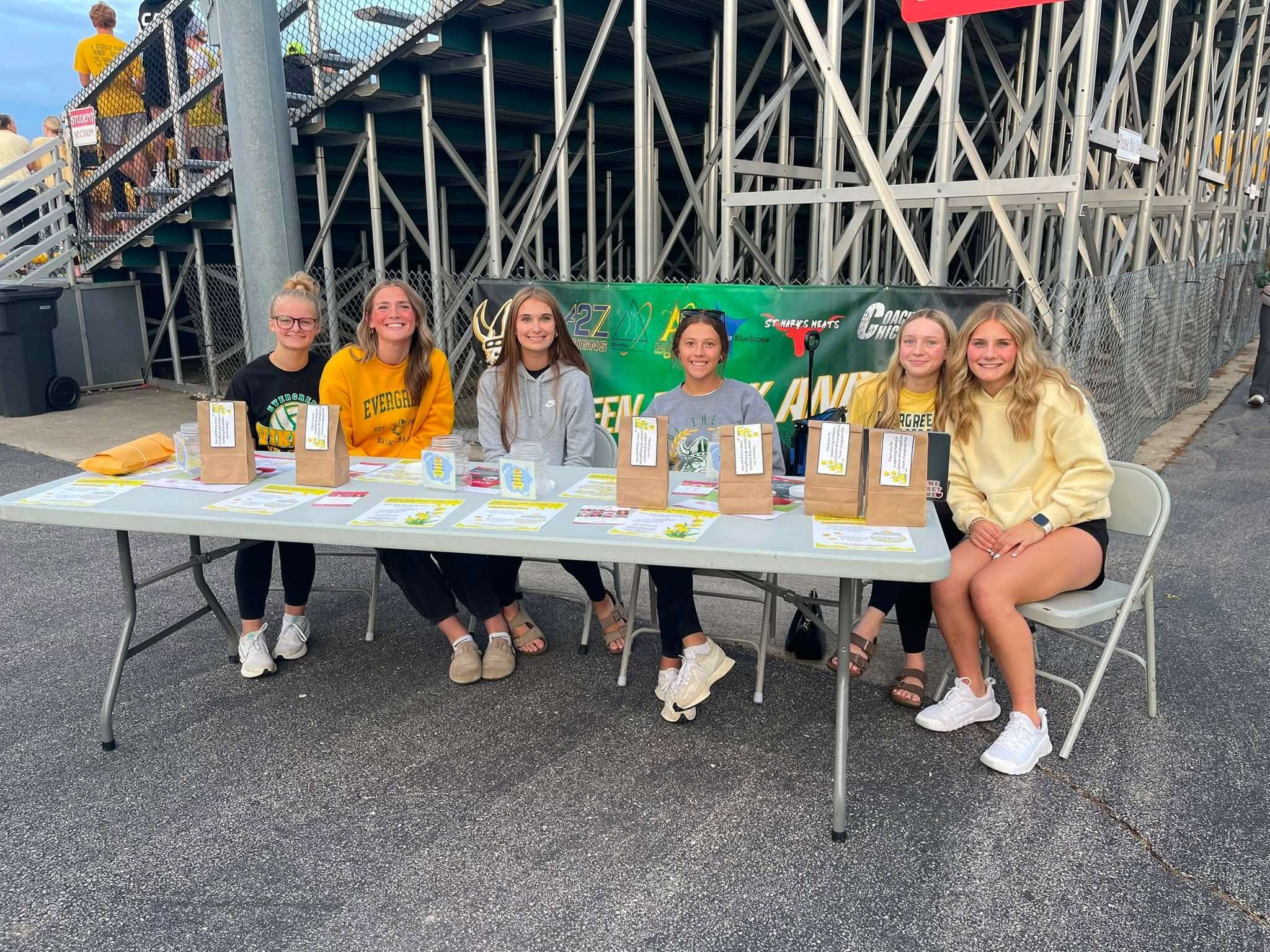 Evergreen FFA members at the Gold Game table