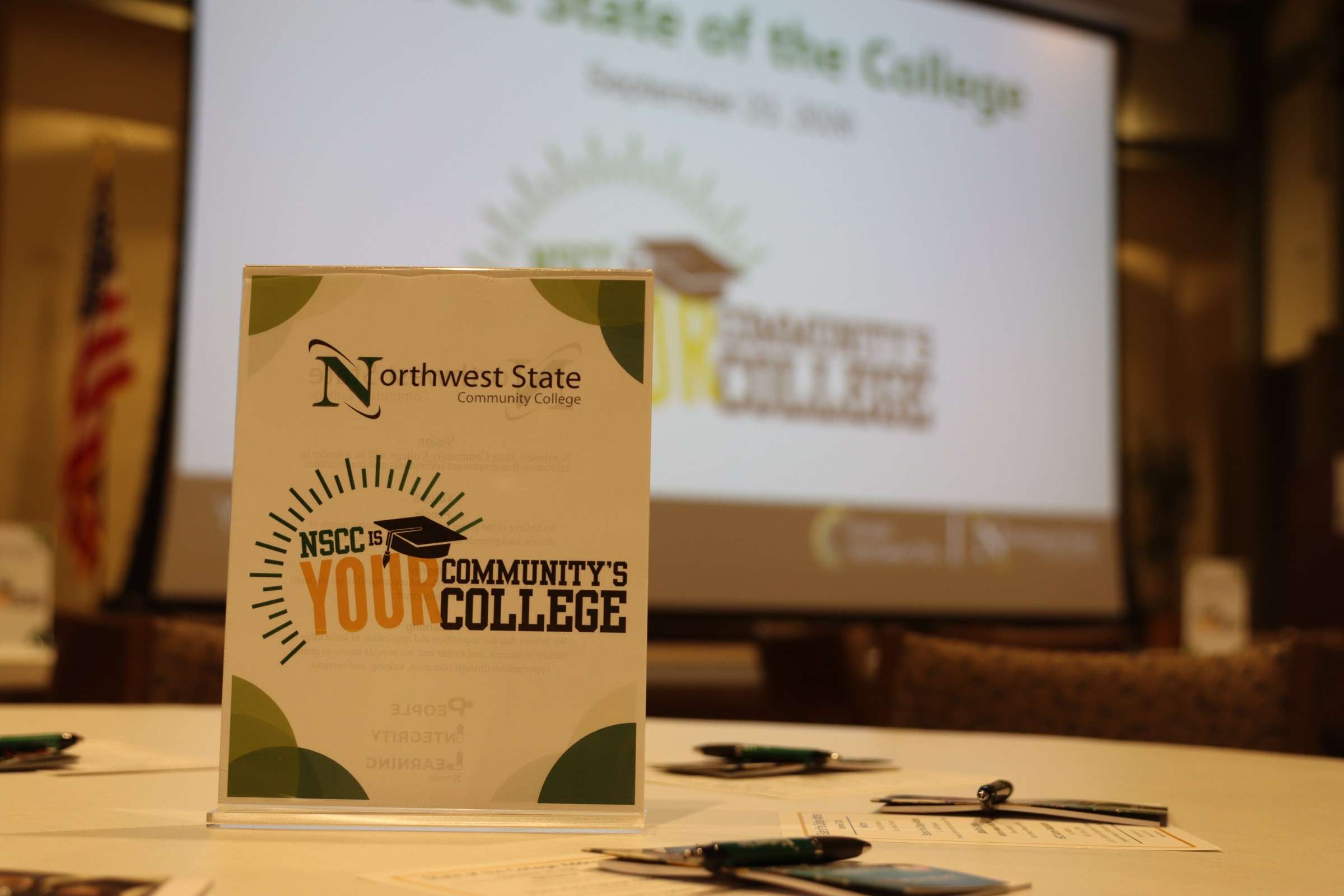 NSCC is Your Community's College table sign at the State of the College address