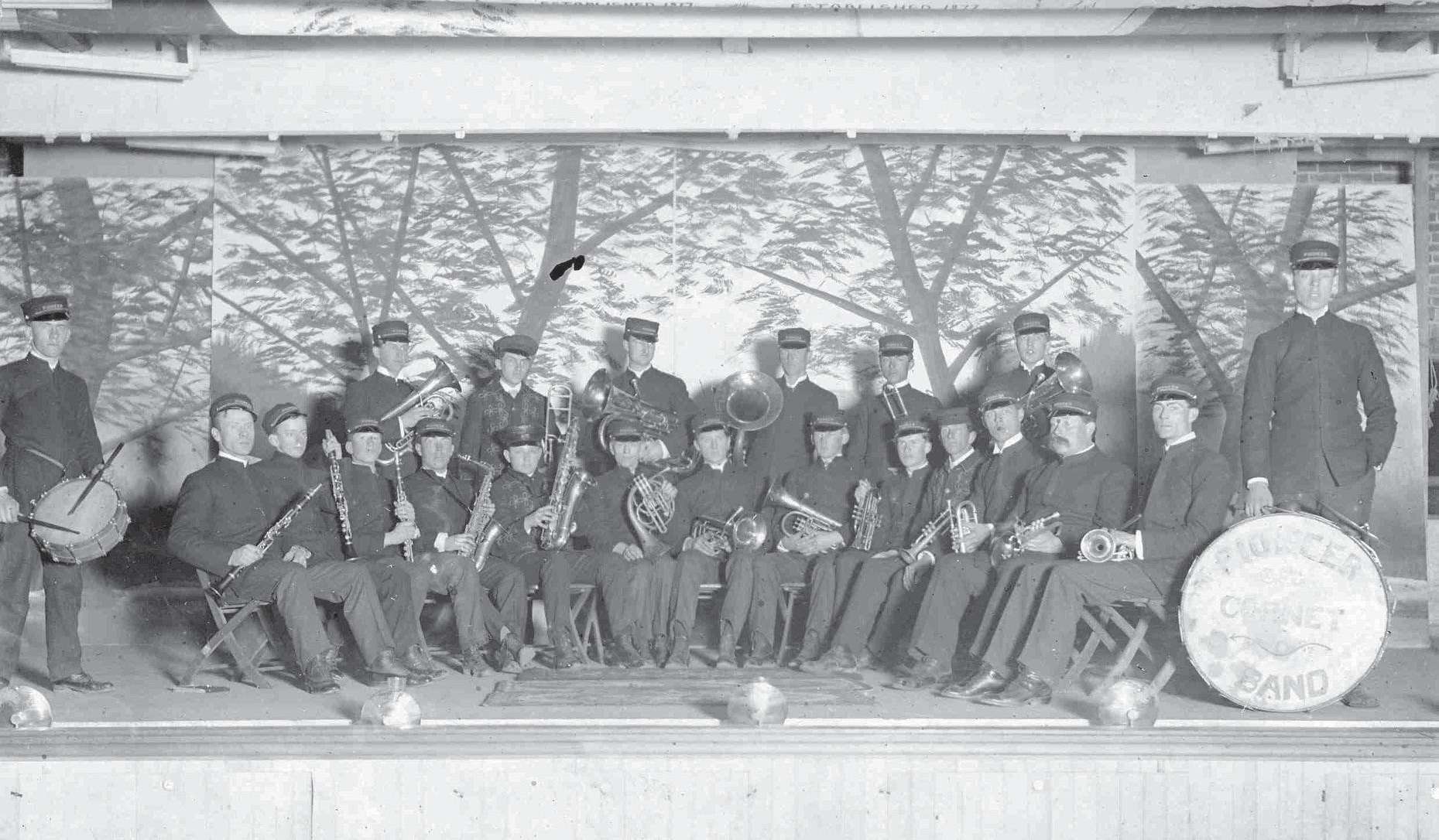 Members of the Pioneer Cornet Band pose with their instruments, circa 1911-1912, Pioneer, Ohio