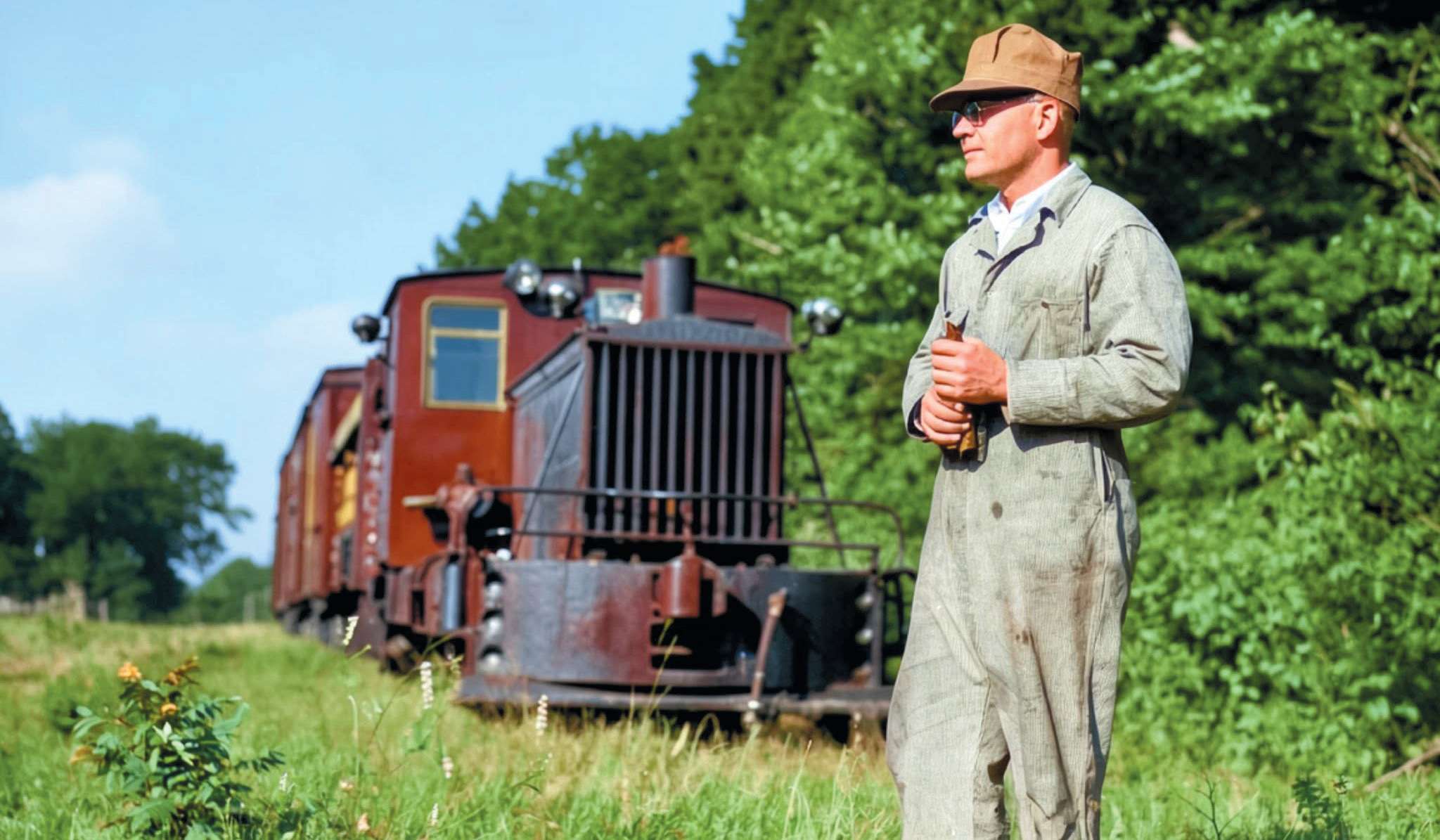 Pioneer & Fayette Railroad founder Earl S. Snyder with one of the company’s trains, 1933