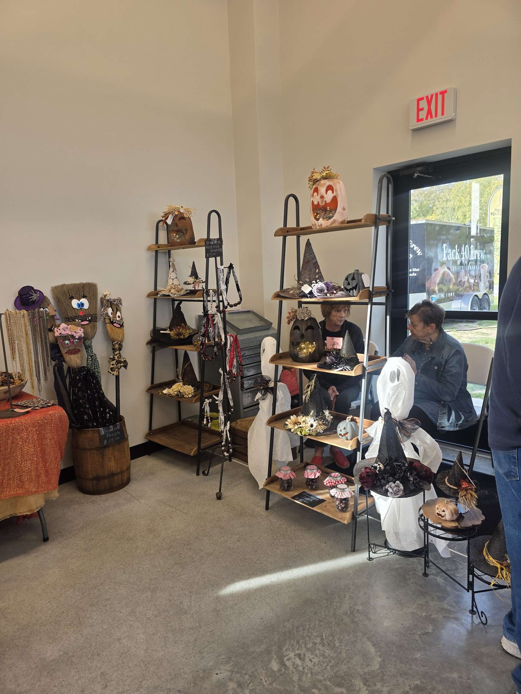 Shelves of handmade items at a vendor booth
