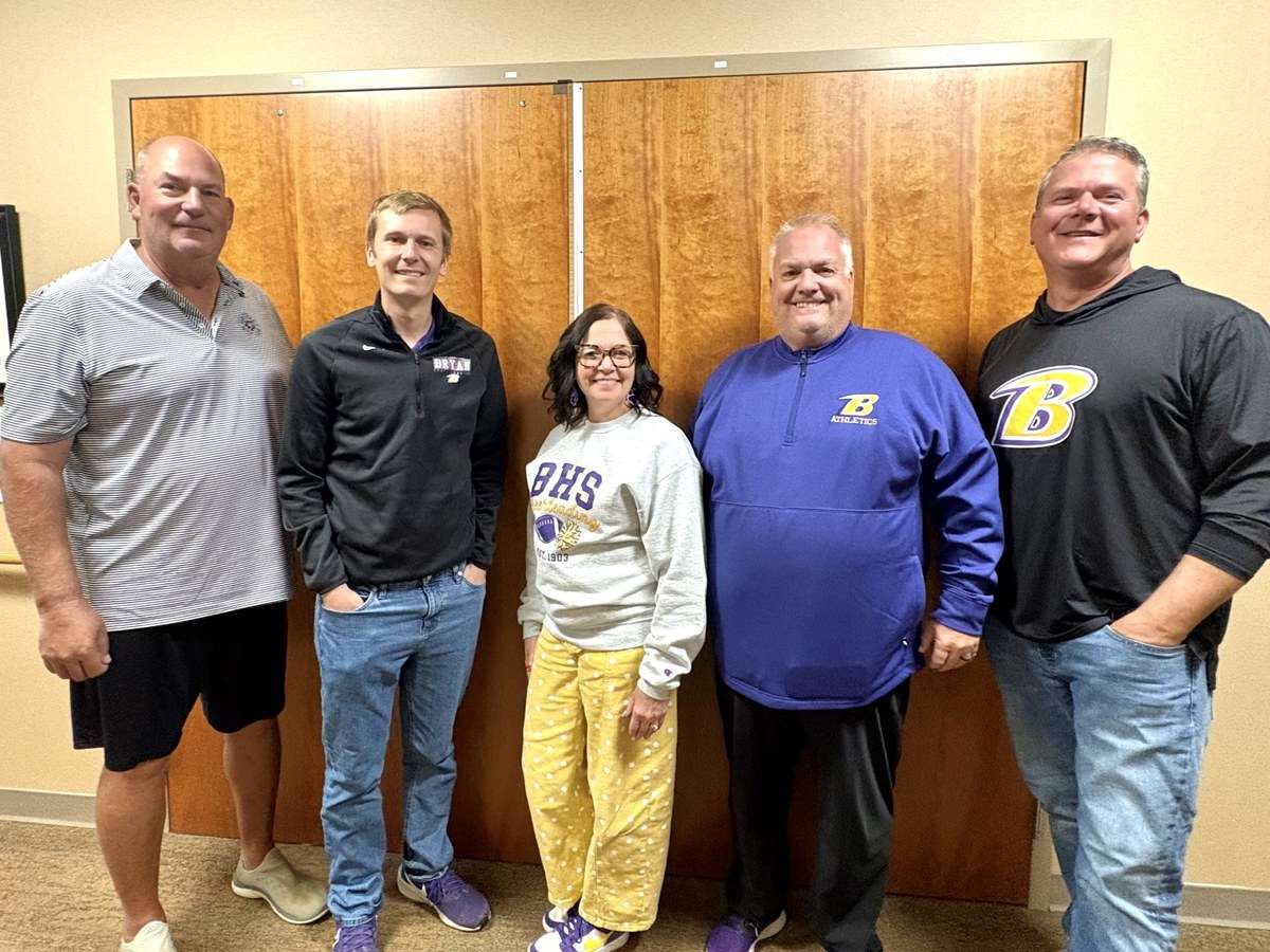 Bryan fall coaches with Athletic Director Jason Brown at the Bryan Rotary Club