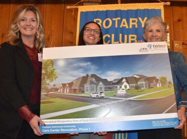 Tina Draine, Tammy Allison and Mari Yoder with a rendering of the Fairlawn Retirement Community renovation project