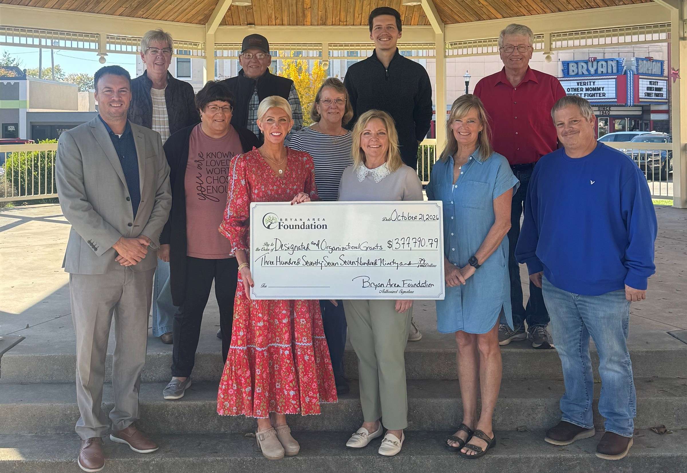 Bryan Area Foundation grant recipients with the $377,790.79 check