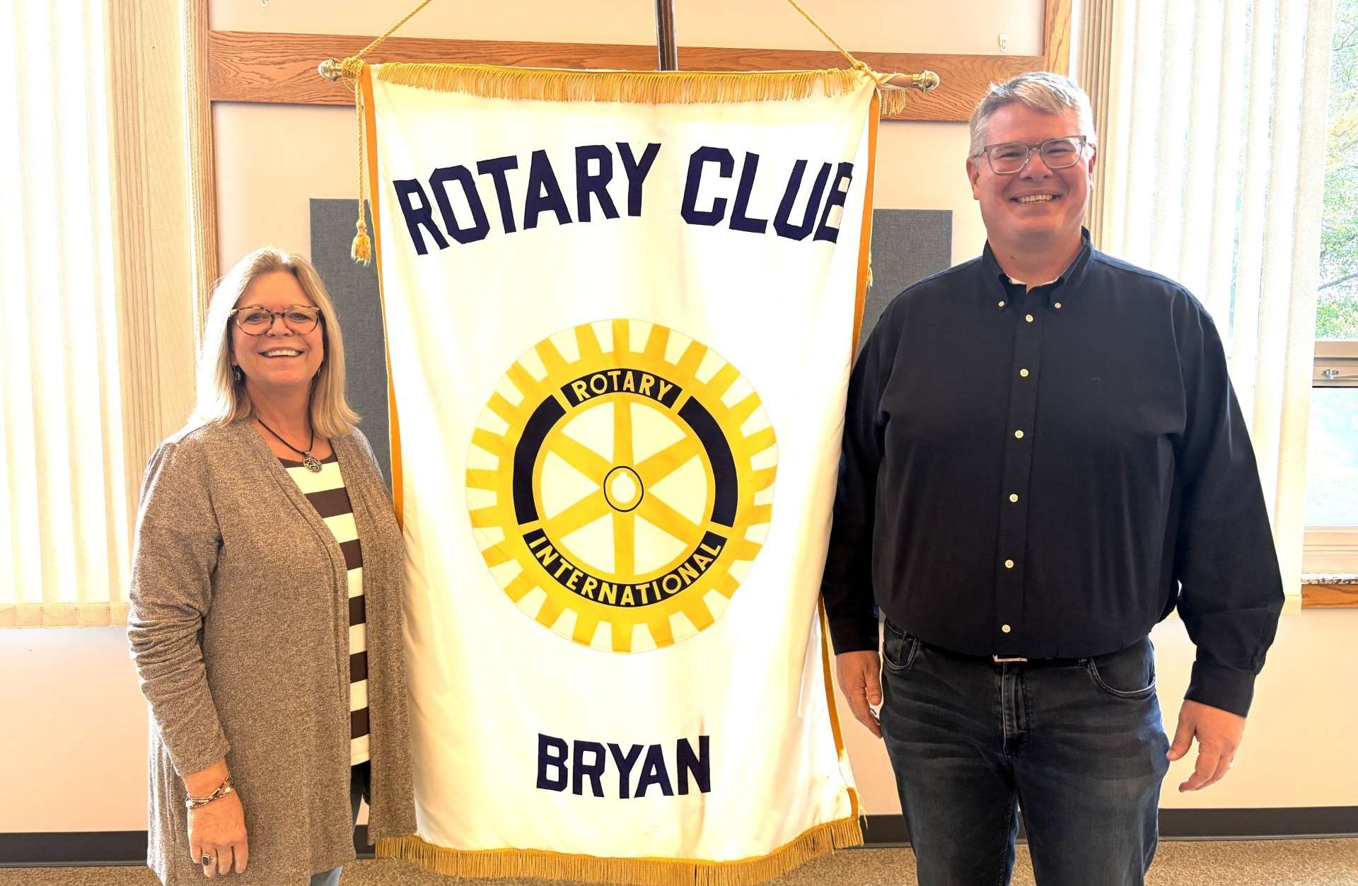 Rotarian Tami Bergman and speaker Russ Davies