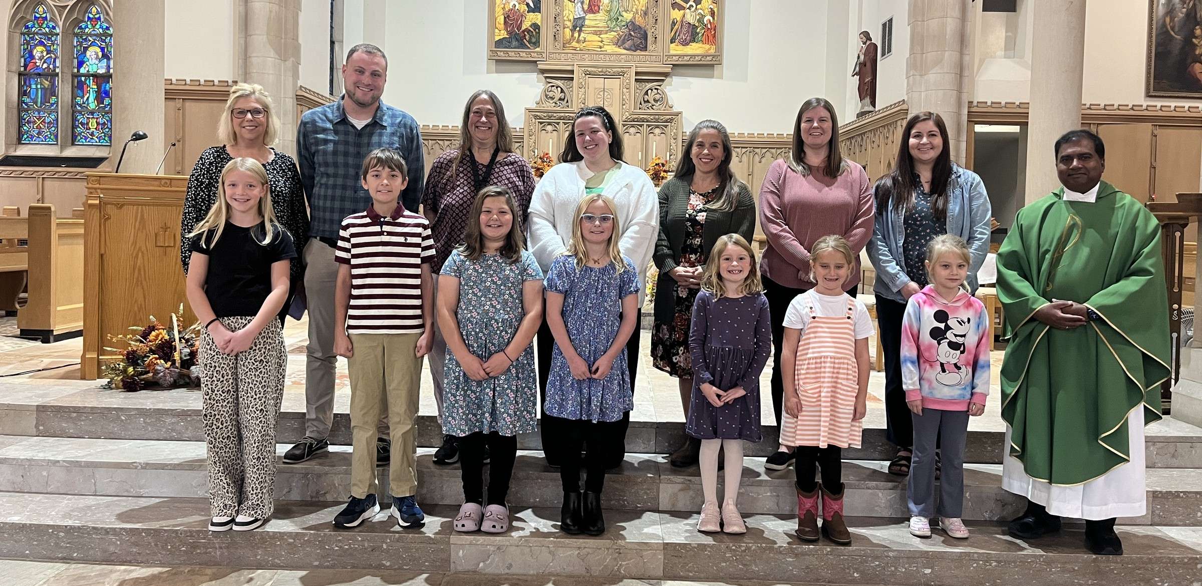 St. Mary School Terrific Tiger recipients with teachers and Father Clement
