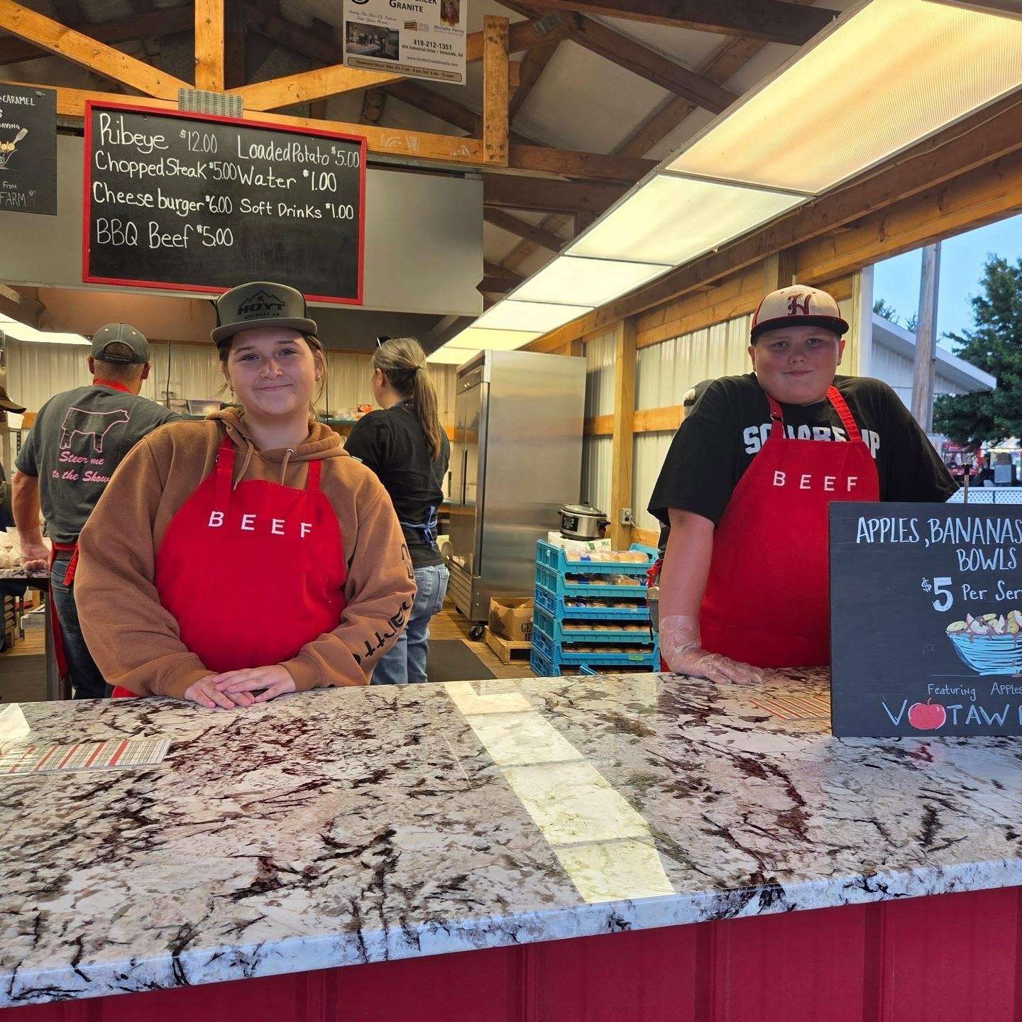 Daisy Baker and Jakob Bible at the beef stand