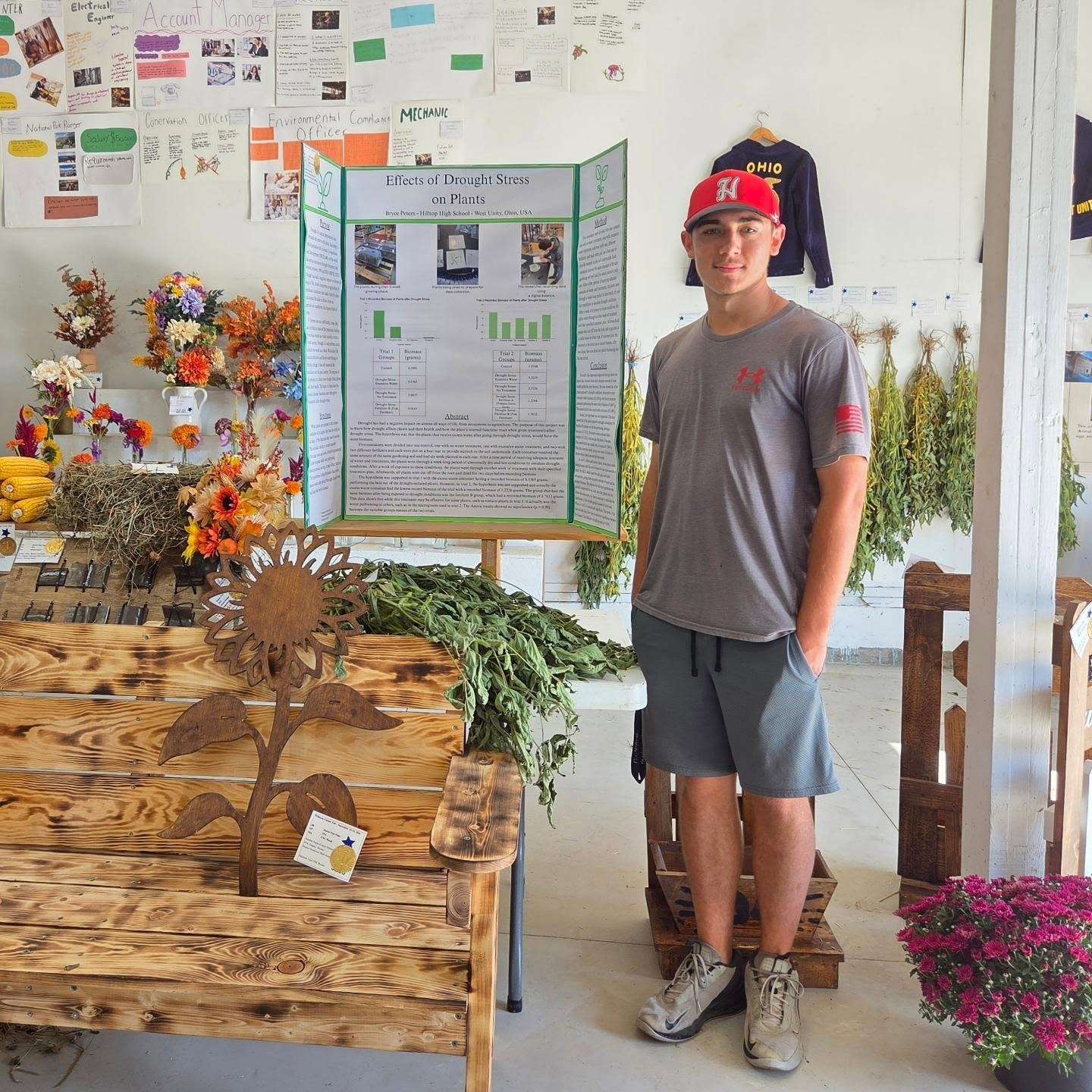 Bryce Peters with his best of show research project