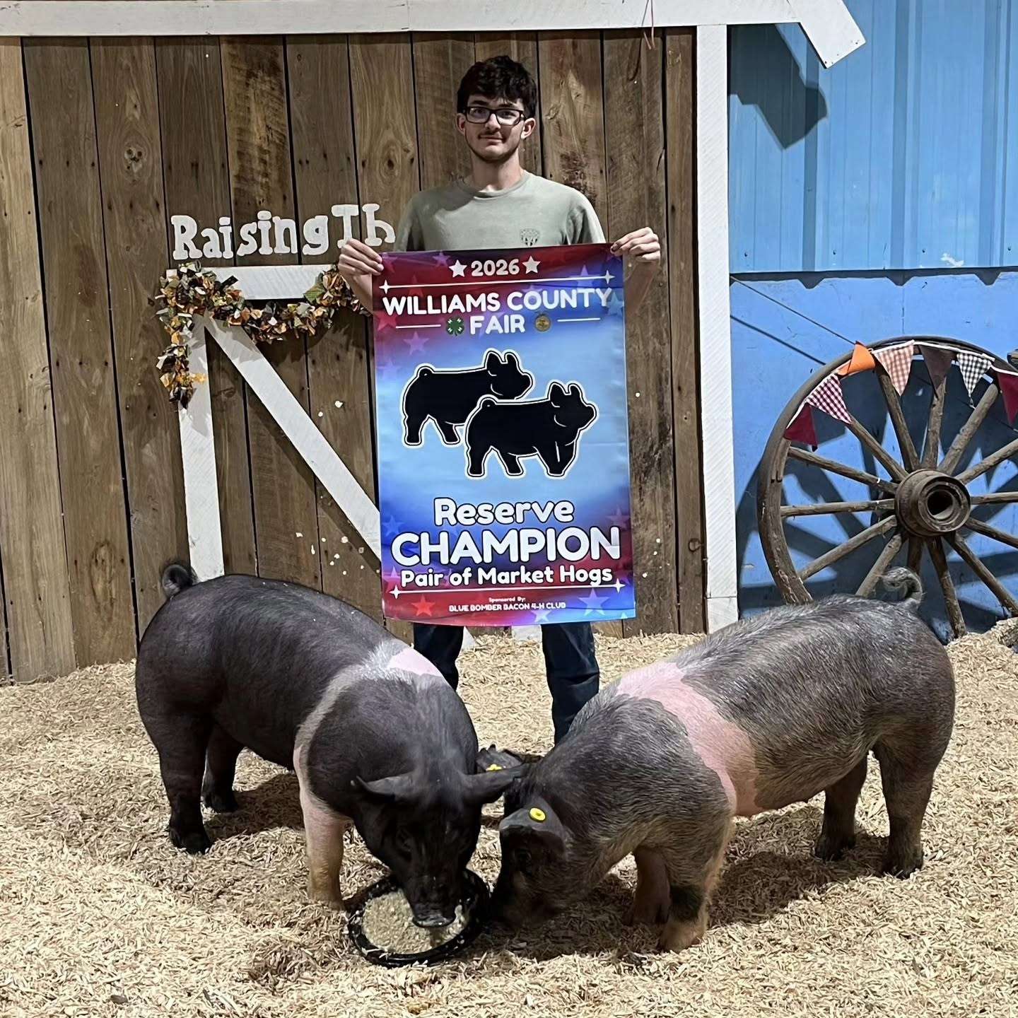 Landon Bleikamp with his reserve champion market pair of swine