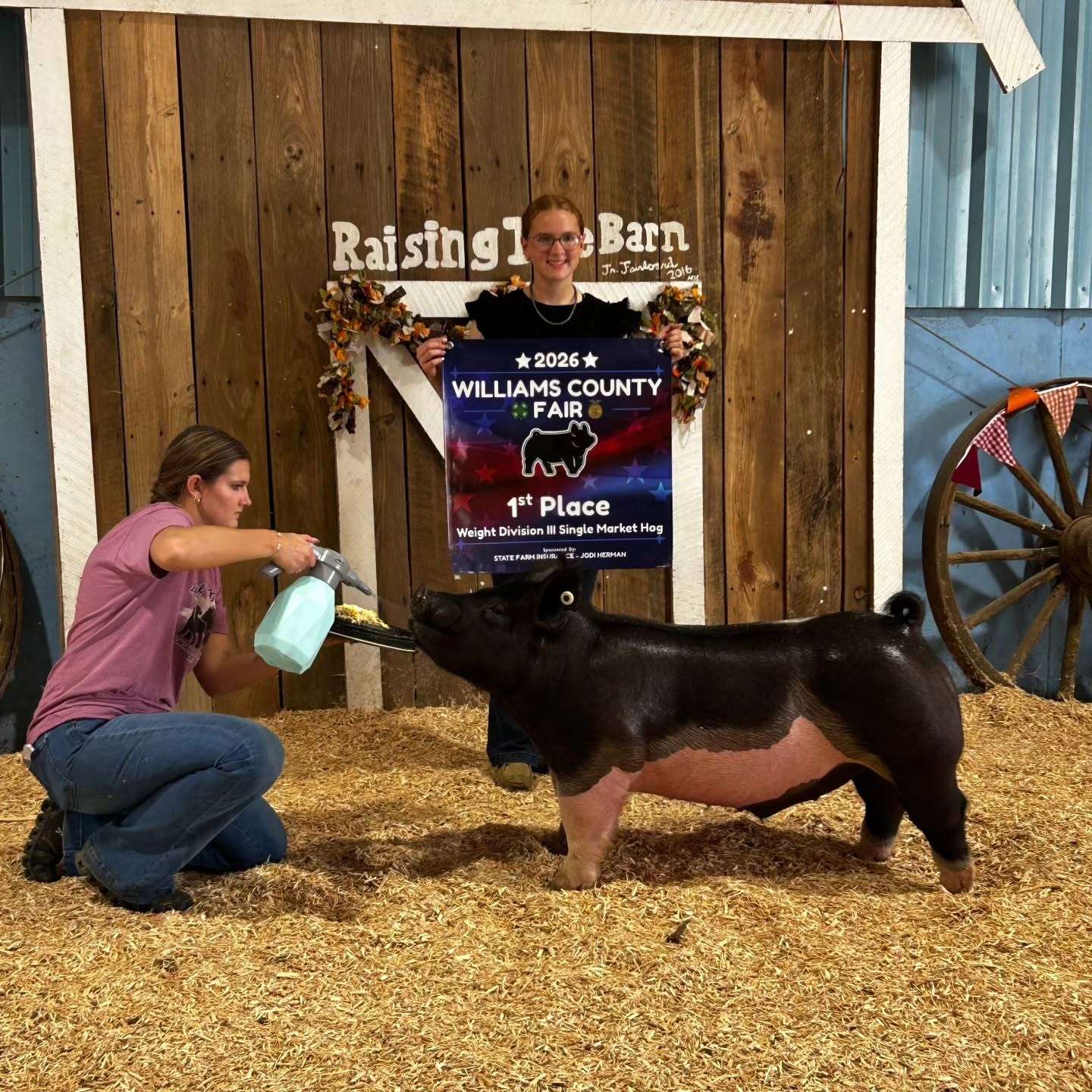 Rachel Dickinson with her first place market hog