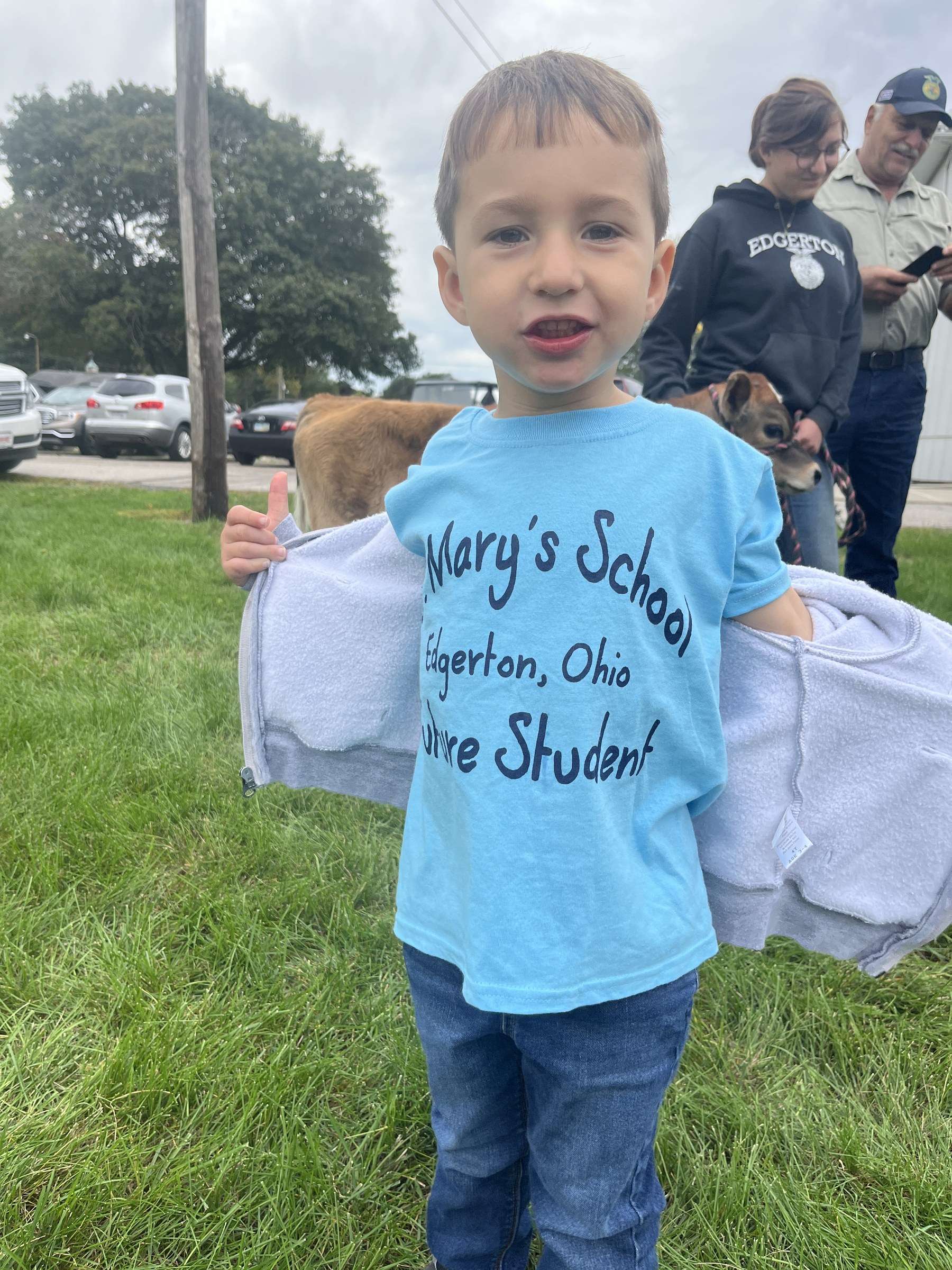 St. Mary School Grandparent Day carnival: a boy in a St. Mary’s School shirt