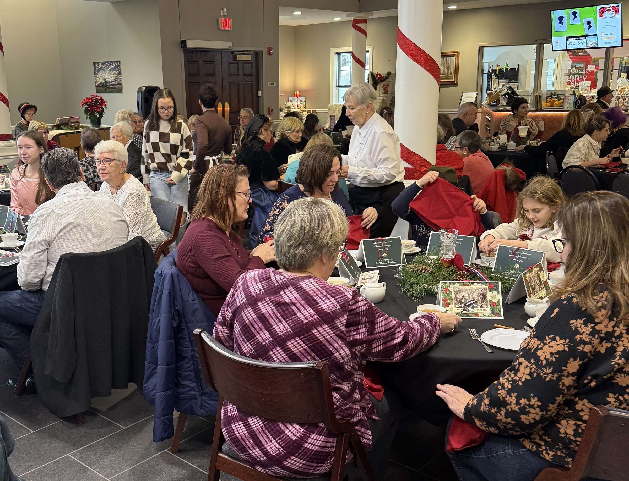 Guests at an earlier Christmas Tea at the Museum of Fulton County