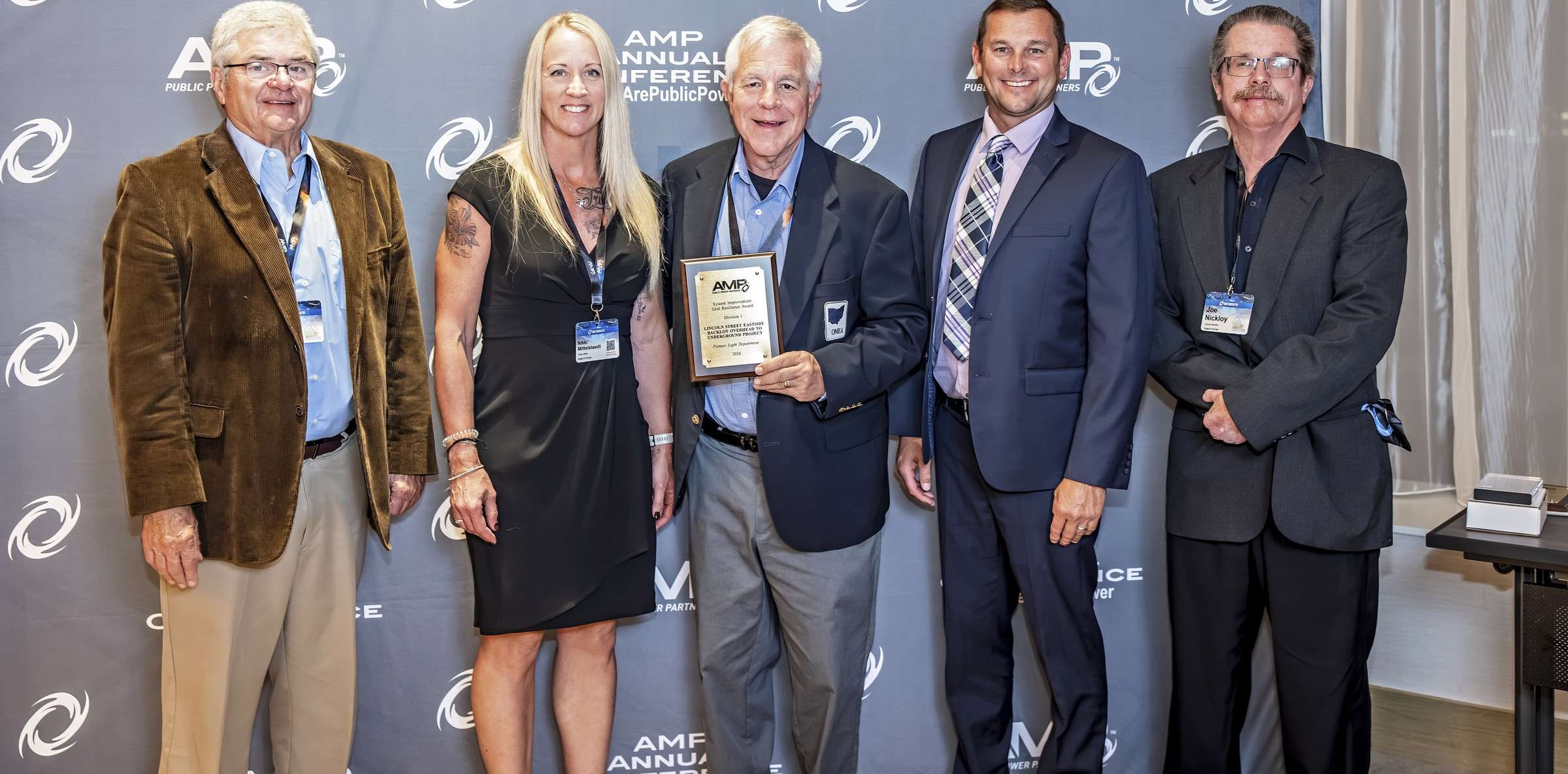 Al Fiser, Nikki Mittelstaedt, Ed Kidston, Anthony Burnett and Joe Nickloy with the AMP System Improvement Award