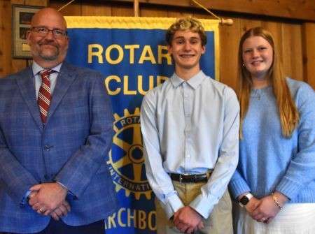 Archbold High School Principal Royal Short with band field commanders Bo King and Adelynn Nafziger at the Archbold Rotary Club