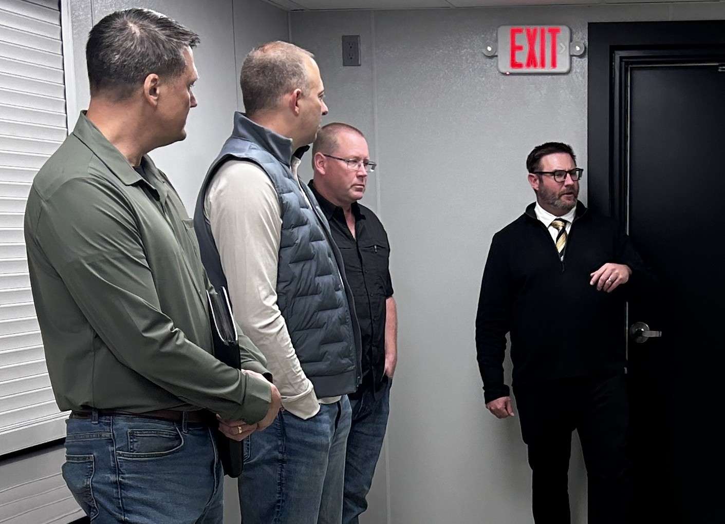 Pettisville board members and Superintendent Josh Clark inside the new South Field building